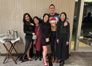 The William Wright Commercial administrative team Vanessa Imani, Michelle Wang, Danika Wong, Matthew Everitt, and Ada Xu at the William Wright Commercial Christmas Party 2023